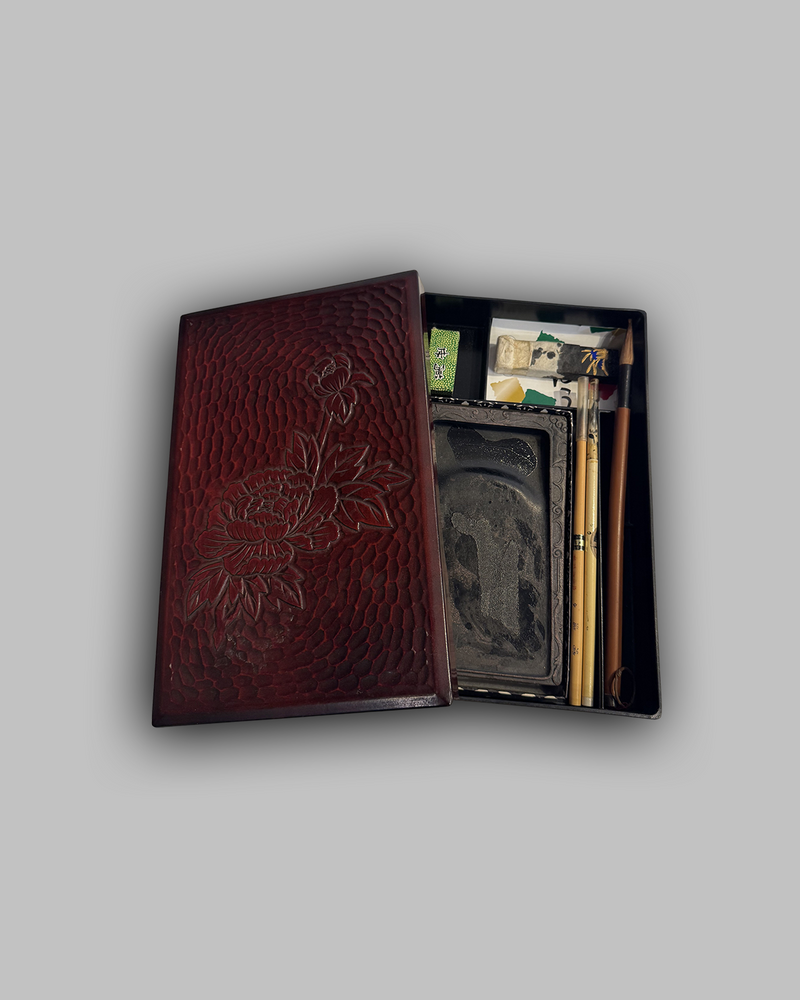 Antique red lacquer artist box with supplies