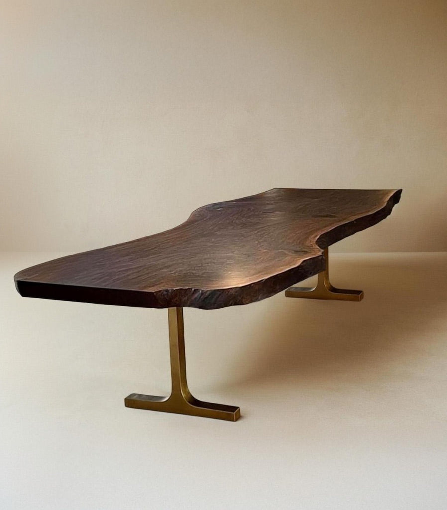 Claro walnut dining table with cast bronze T legs