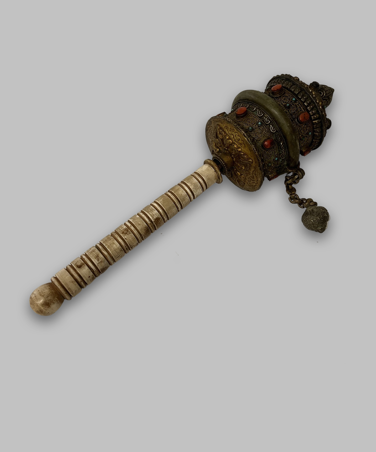 Buddhist hand held prayer wheel with gemstones and bone handle