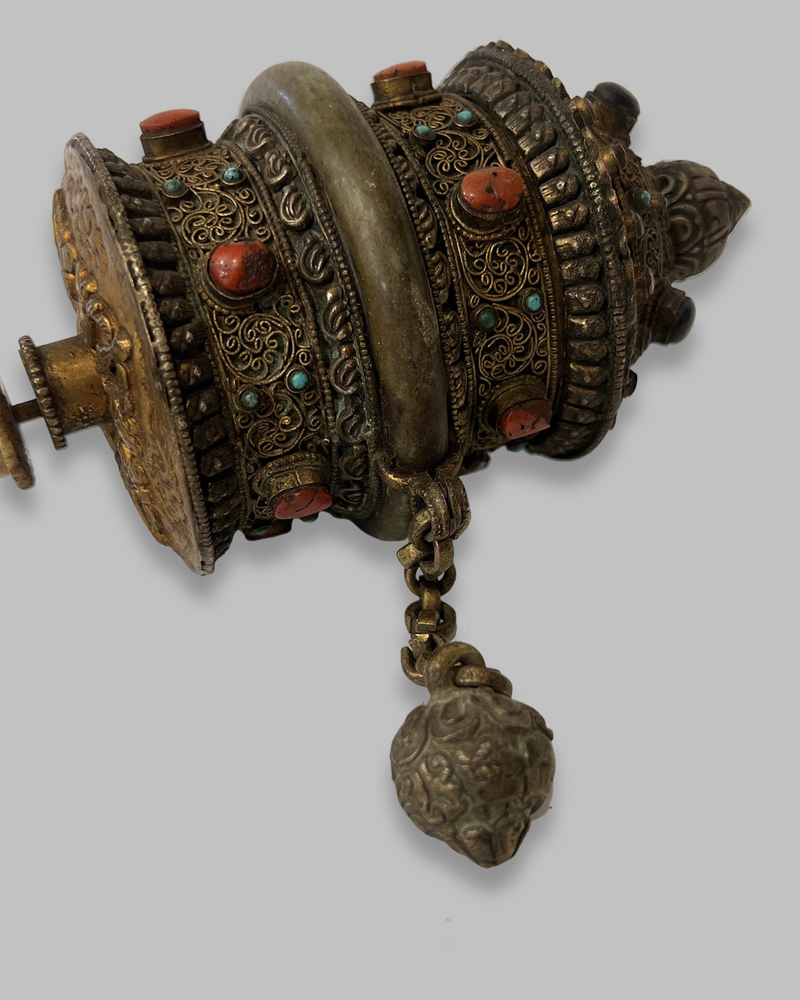 Buddhist hand held prayer wheel with gemstones and bone handle