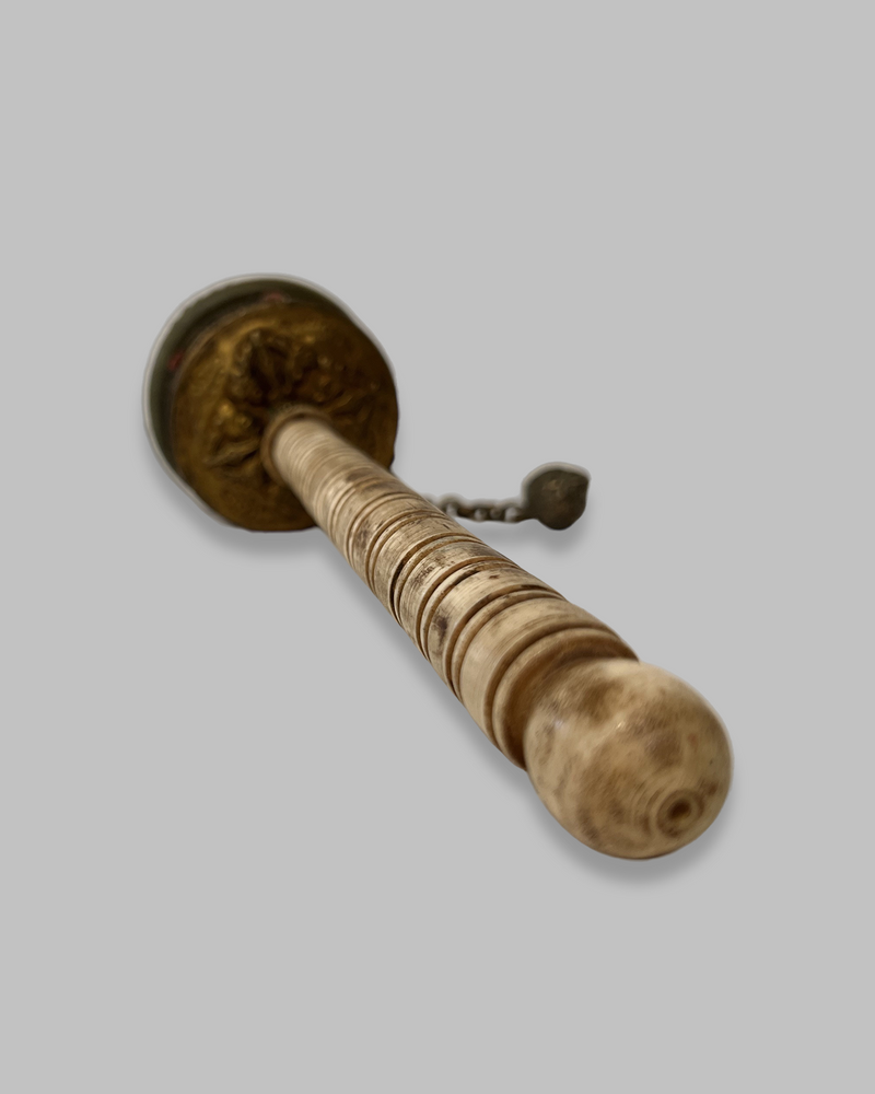 Buddhist hand held prayer wheel with gemstones and bone handle