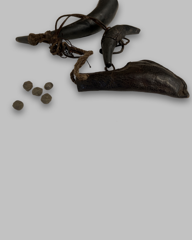 Antique bullet pouch and priming flask