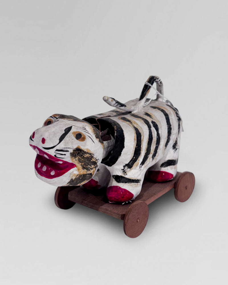 Vintage paper mache "Hariko", Japanese folk art nodding head tiger, on wheeled base.