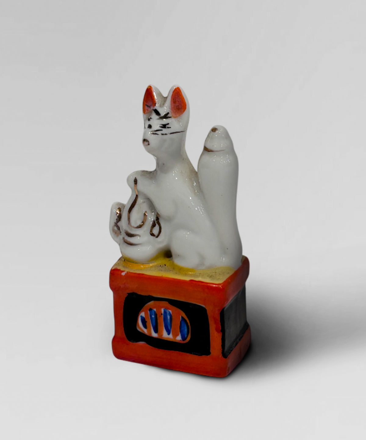 Vintate miniature Japanese Inari Shrine, Kintsune fox figurine, made of porcelain.
