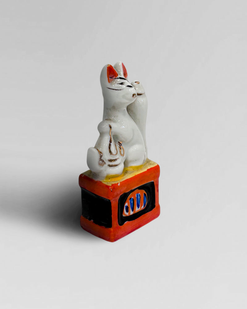 Vintate miniature Japanese Inari Shrine, Kintsune fox figurine, made of porcelain.