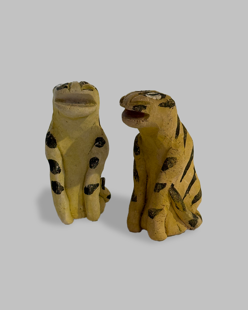 Whimsical folk art ceramic tigers from Japan