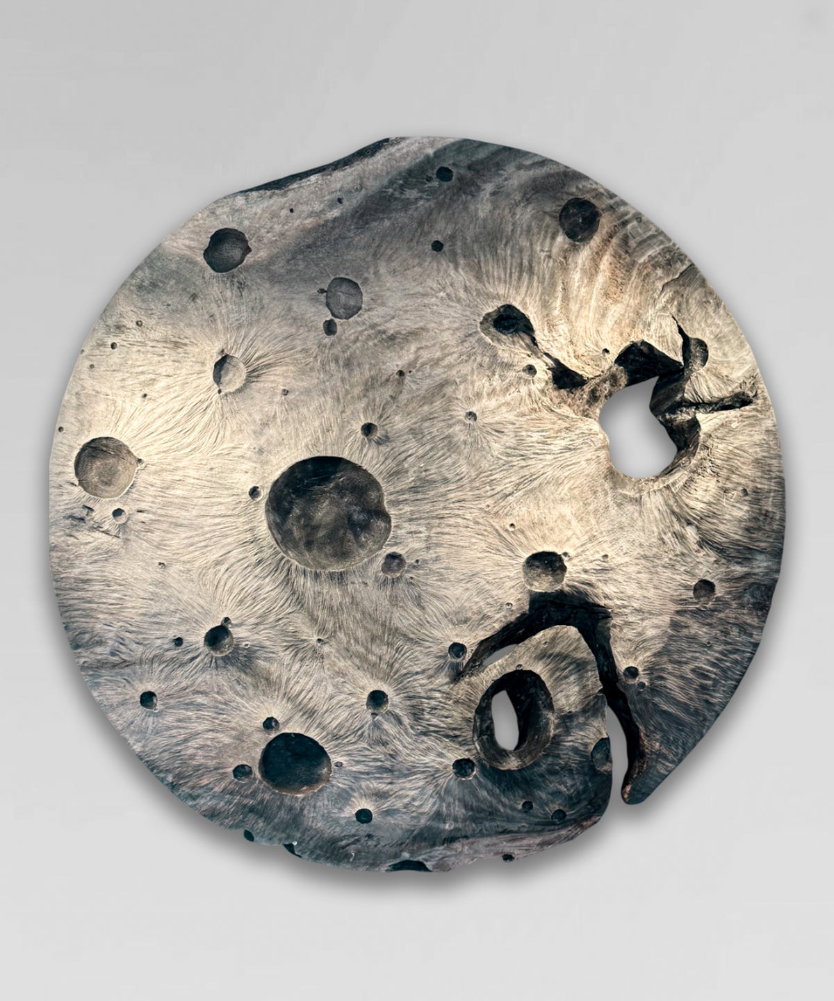 Contemporary wood carving of the moon