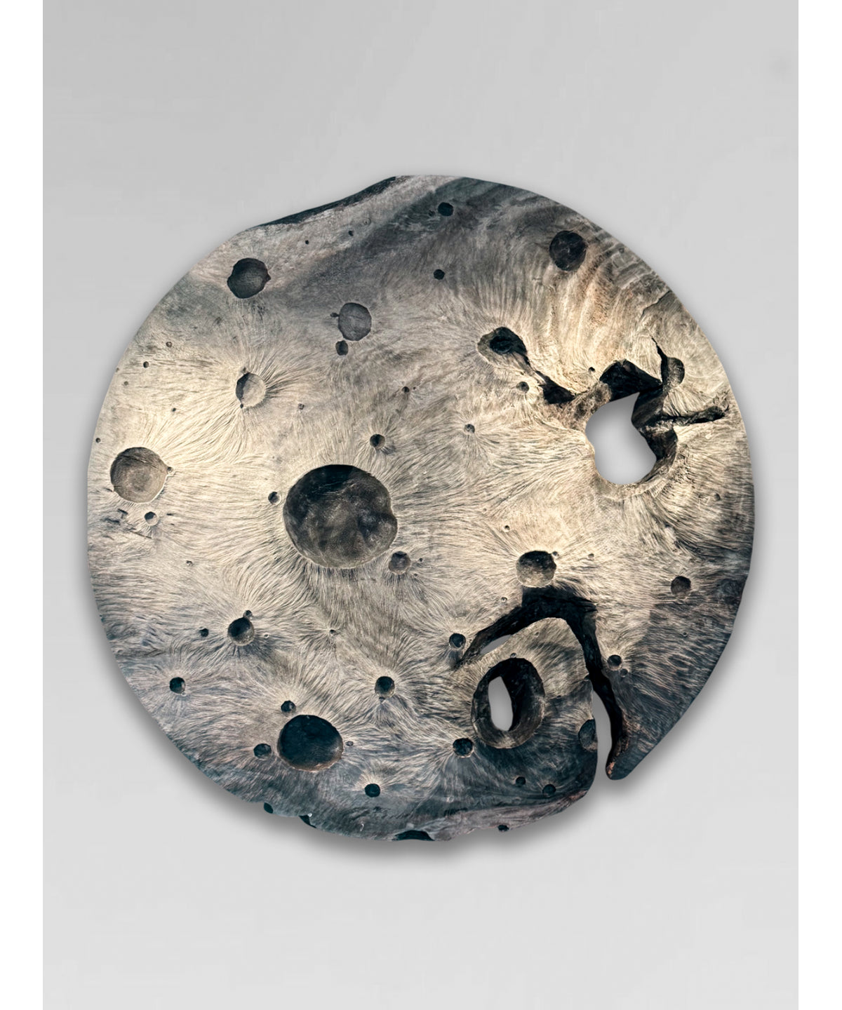 Contemporary wood carving of the moon