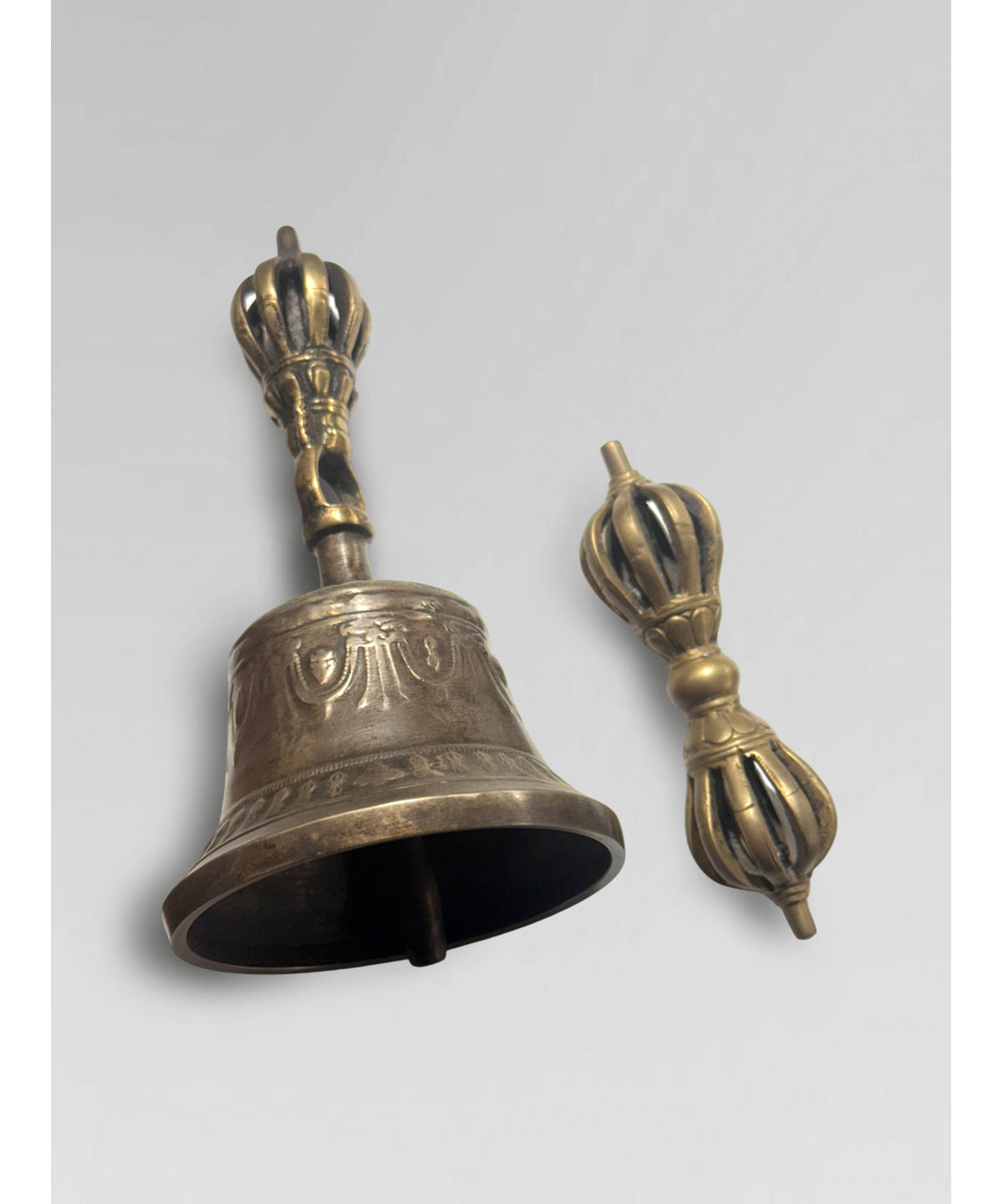 Tibetan bell (Ghanta) and Tibetan spiritual object (Dorje).
