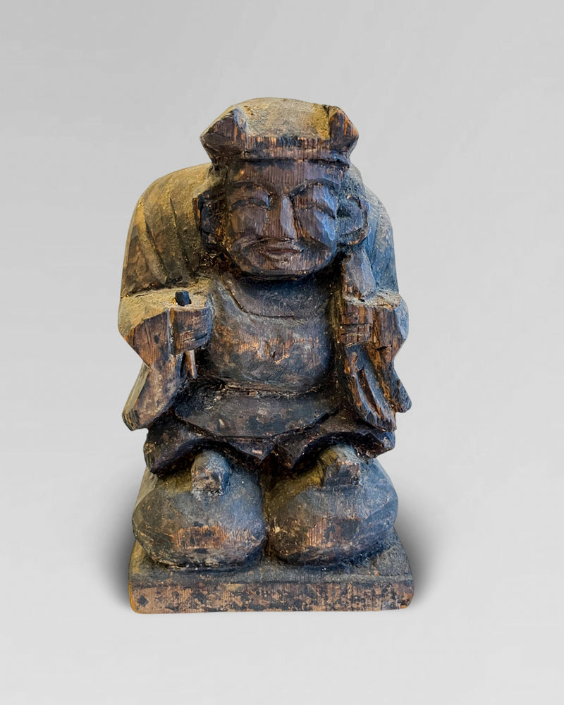 Antique Wooden statue of Daikoku
