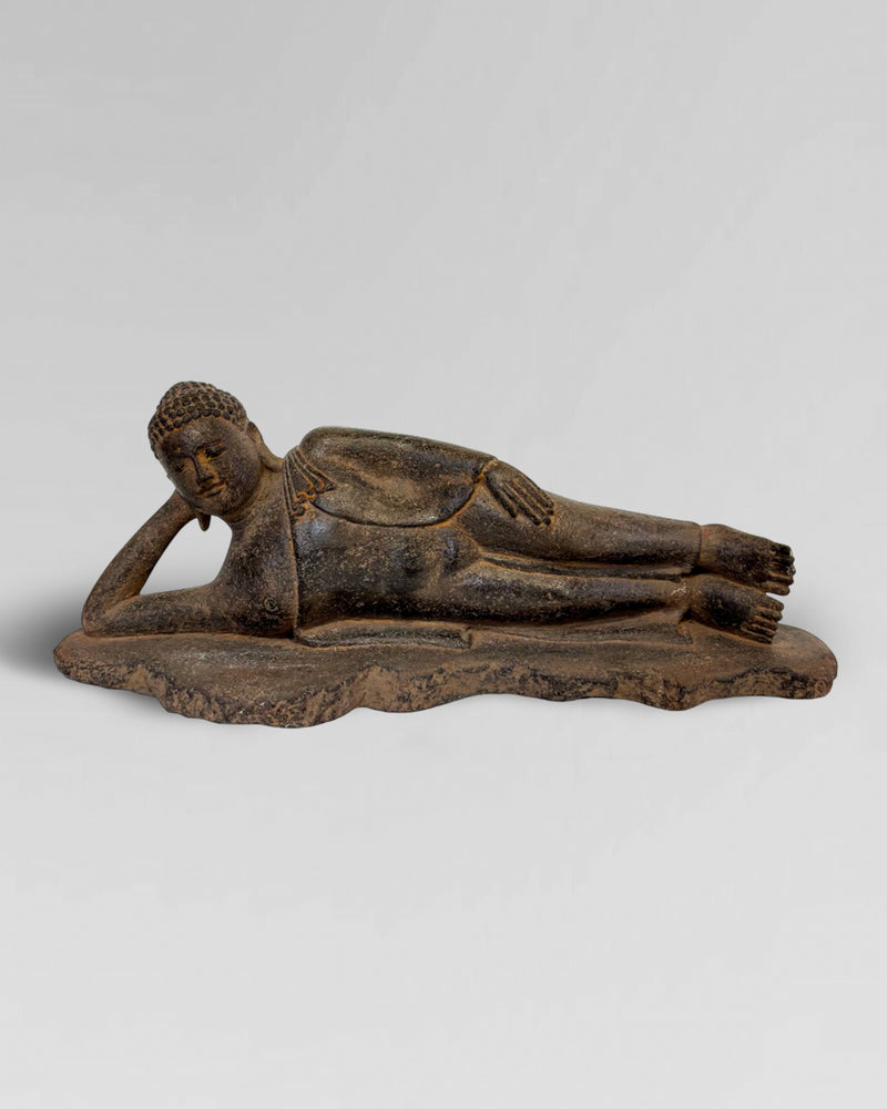 Solid stone reclining Buddha