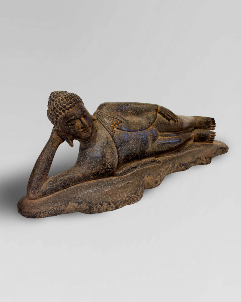 Solid stone reclining Buddha