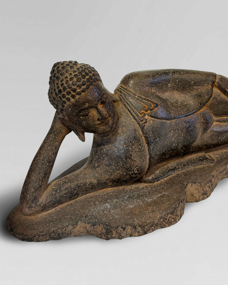 Solid stone reclining Buddha