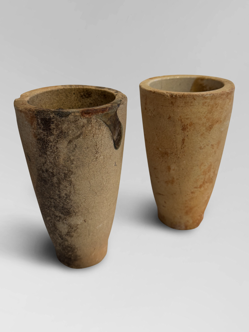 Pair of clay crucibles