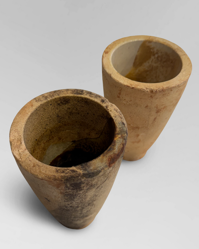 Pair of clay crucibles