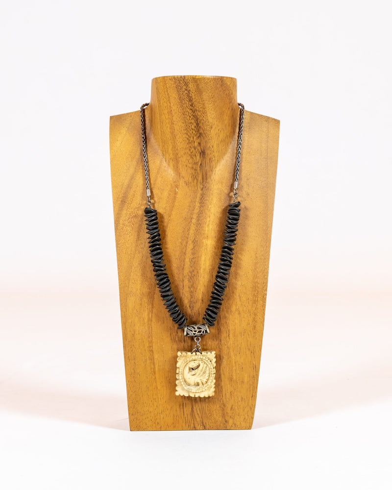 Hand Carved Bone Pendant