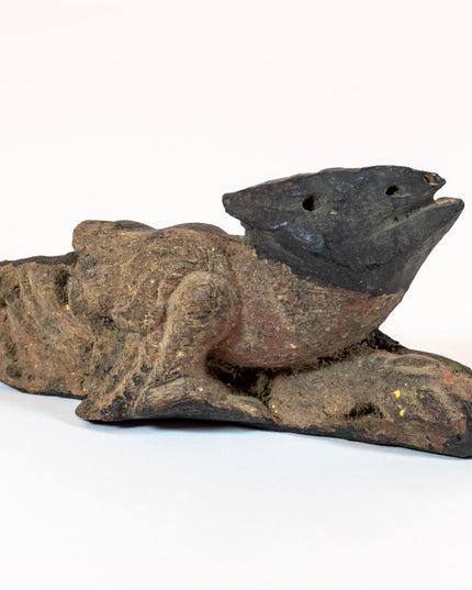 Folk carving of Garuda bird