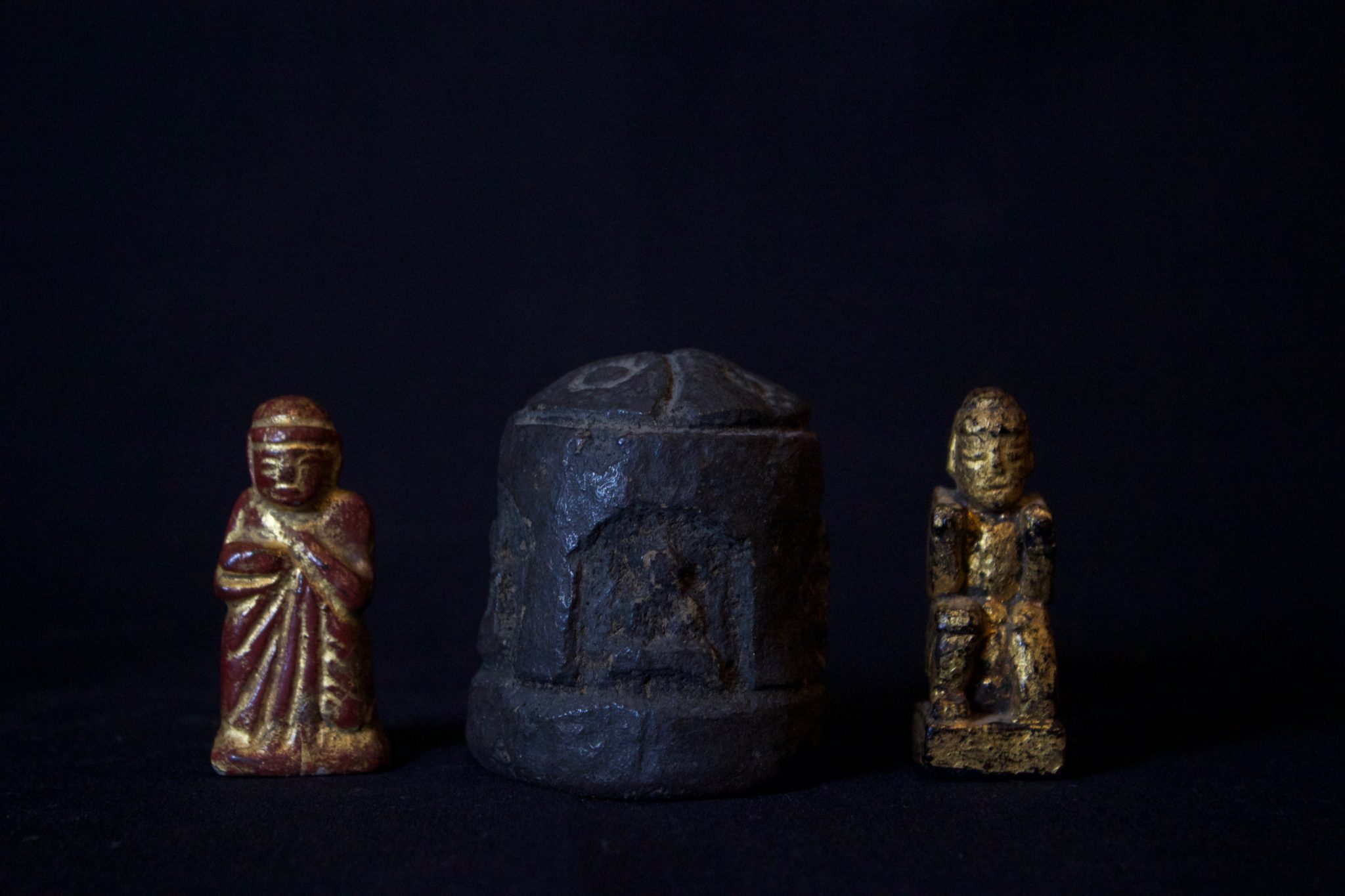 Burmese Medicine Figurine Myanmar (Burma) Late 19th c. Mixture of herbs For healing potions The Shaman makes these medicine figures only between 3:00 and 6:00 am. He will use them to chip off small bits from the bottom side with which to prepare healing elixirs for his patient. 2 1/2" to 3", Left to right - $375., $240., $395.