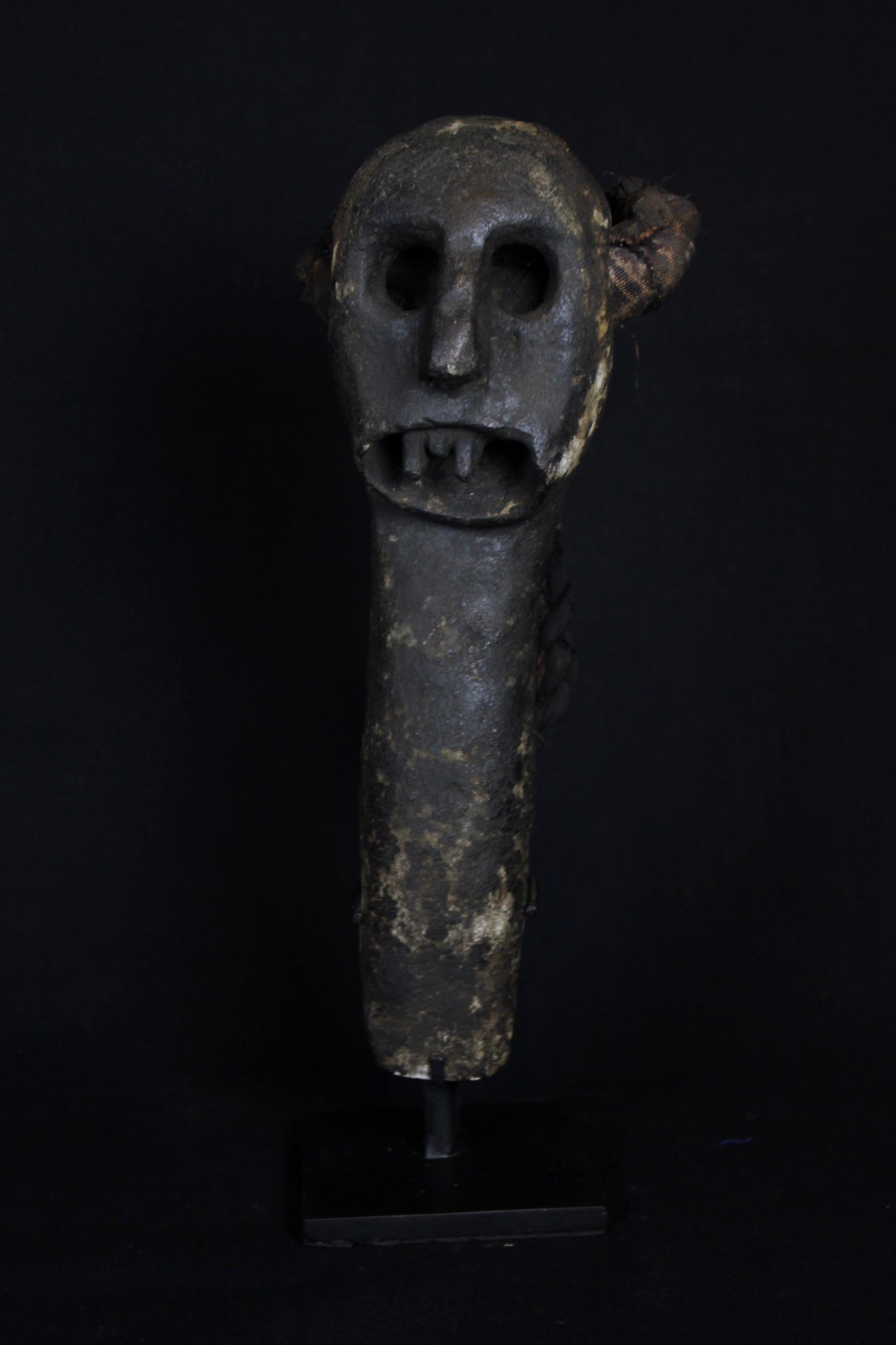 Nitta Watu (rare), Kitchen Protector Figure - Shaman Power Object, West Flores Island, Lesser Sunda Islands, Indonesia, Maumere district, Nita or Bena Village, Early to mid 19th c, Stone, pigment, cloth strap for hanging. Used to protect a house or home. 14” x 5 ½” x 6”, $1700.