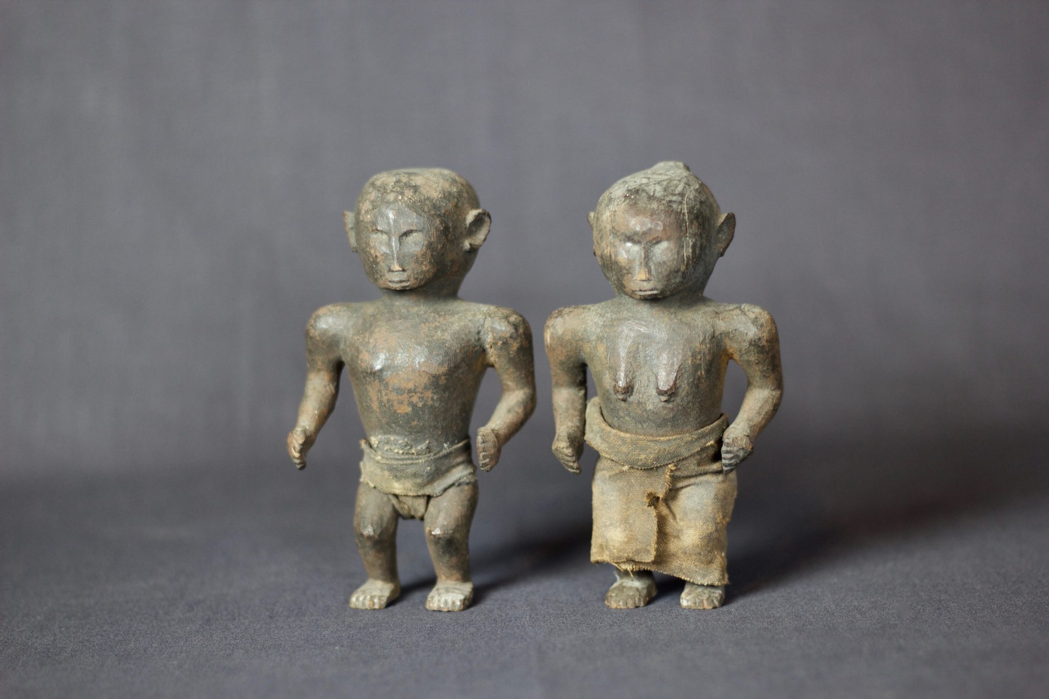 Shaman Healing Couple Effigy, West Sumba Island, Lesser Sunda Islands, Indonesia, Anakalang village Early to mid 20th c, Wood, fiber cloth, patinated with use and age, Used in healing rituals and to fix marriages. Dimensions: (left, male: 5 ¼” x 3 ¼” x 2”); (right, female: 5” x 3” x 2”), $420. sold as a pair