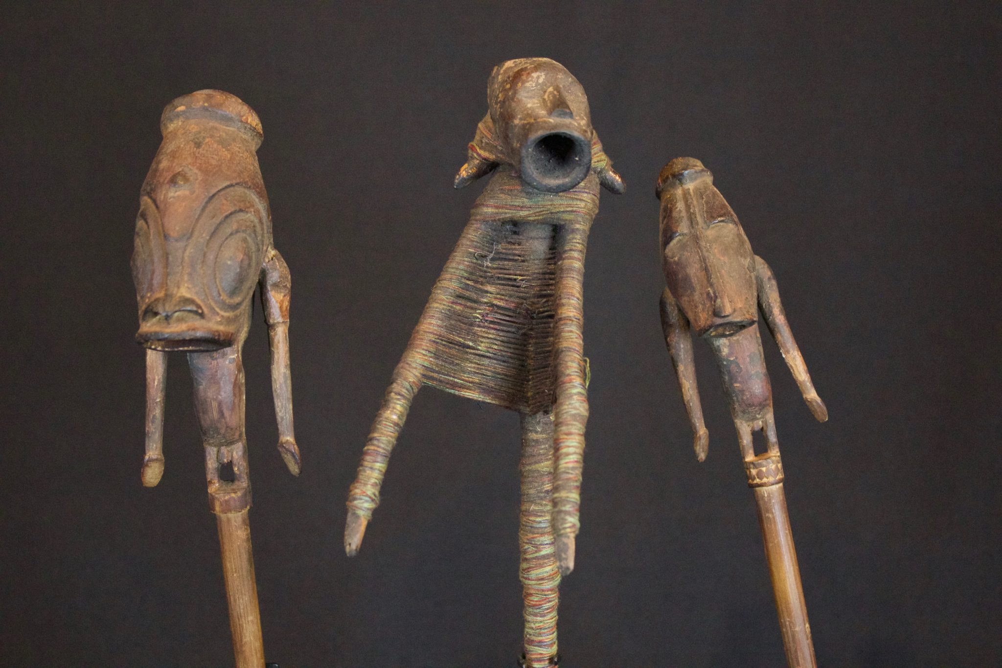 Shaman Talisman Figure, Papúa New Guinea, Indonesia, Early 20th c, Wood. Used in ritual ceremonies to stop rain. (Figure on right - 12 ½” x 2” x 2 ½”, Sold)