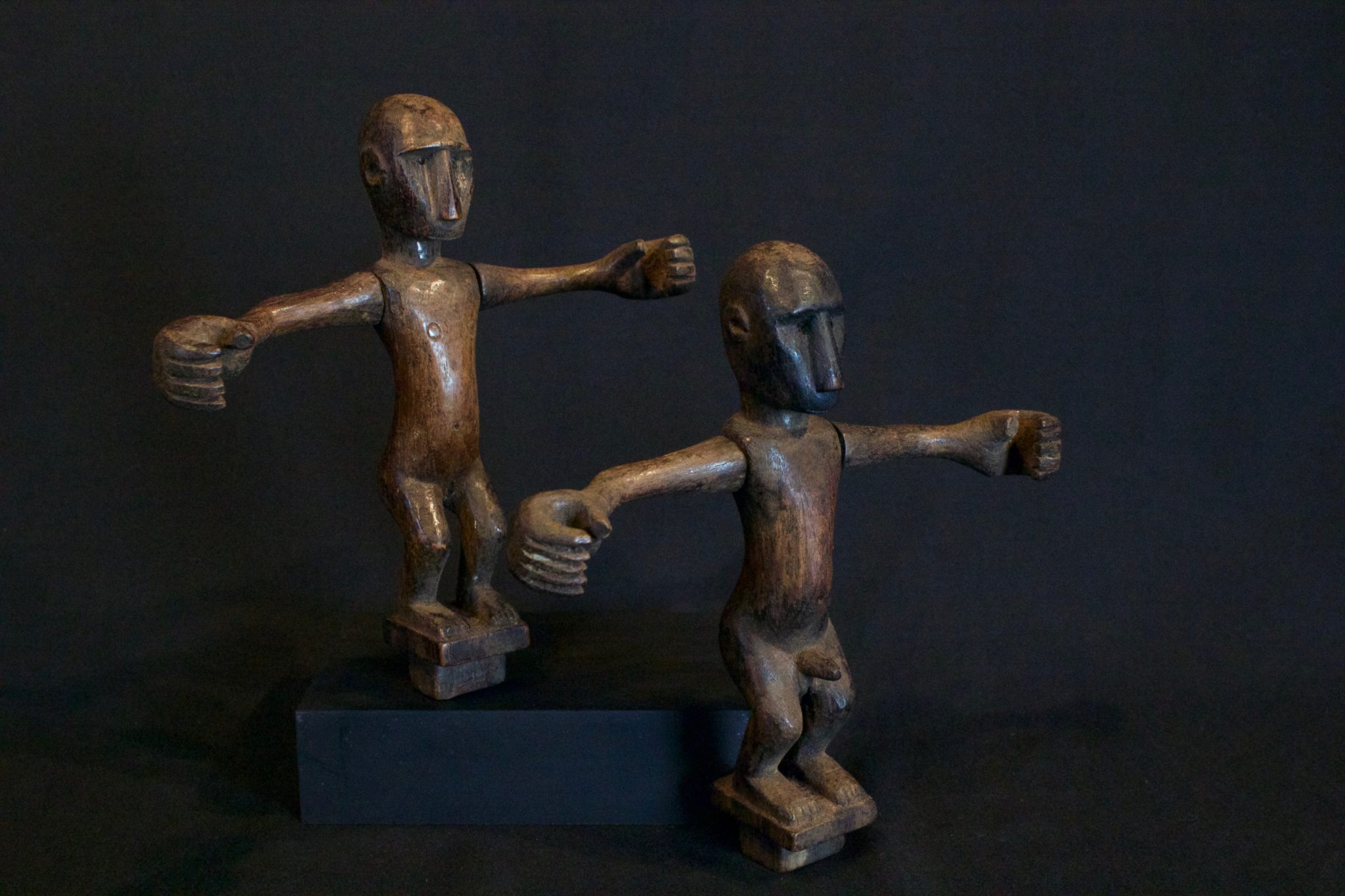 Shaman Healing Figures, Male and Female Couple, Flores Island, Lesser Sunda Islands, Mid 20th c. Wood, patinated with use and age. One of the pair held in each hand during a ceremonial dance for healing a marriage. (female - 8” x 7 ¾” x 1”); (male - 8” x 8” x 1 ½”), $590 (sold as pair)