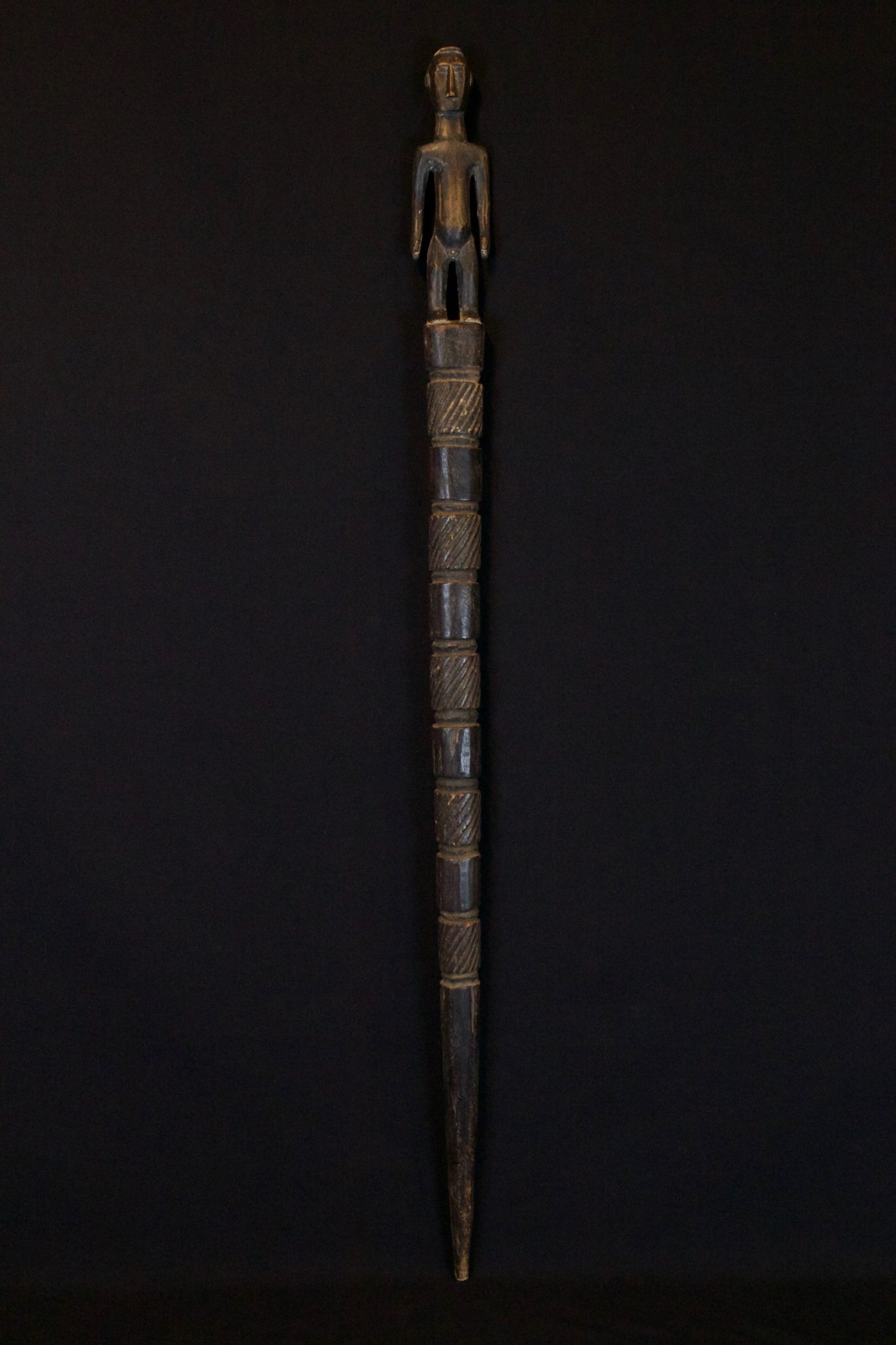 Shaman Staff, Sumba, Island, Lesser Sunda Islands, Indonesia, Mid 20th c, Wood, patinated with use and age. Used in healing rituals. 35 ½ x 2 ¼” x 1 ½”, $700.