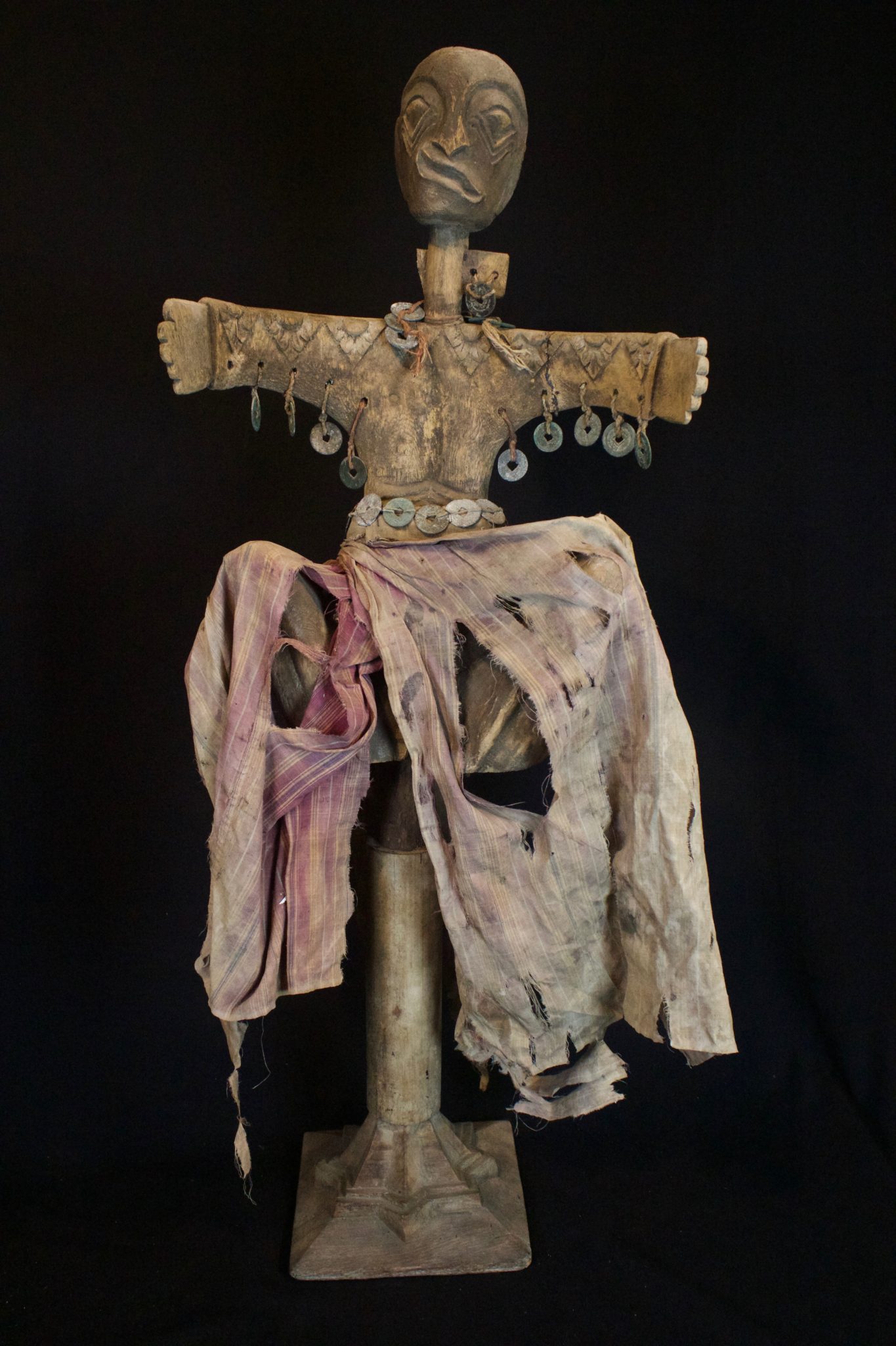 Shaman Healing Fetish Wand Lombok Island, Lesser Sunda Islands, Indonesia, Late 19th c, Wood, cotton cloth, metal coins. This is held in the shaman’s hand to contact the spirits for healing rituals. 35” x 13 ½” x 7 ½”, $2400.