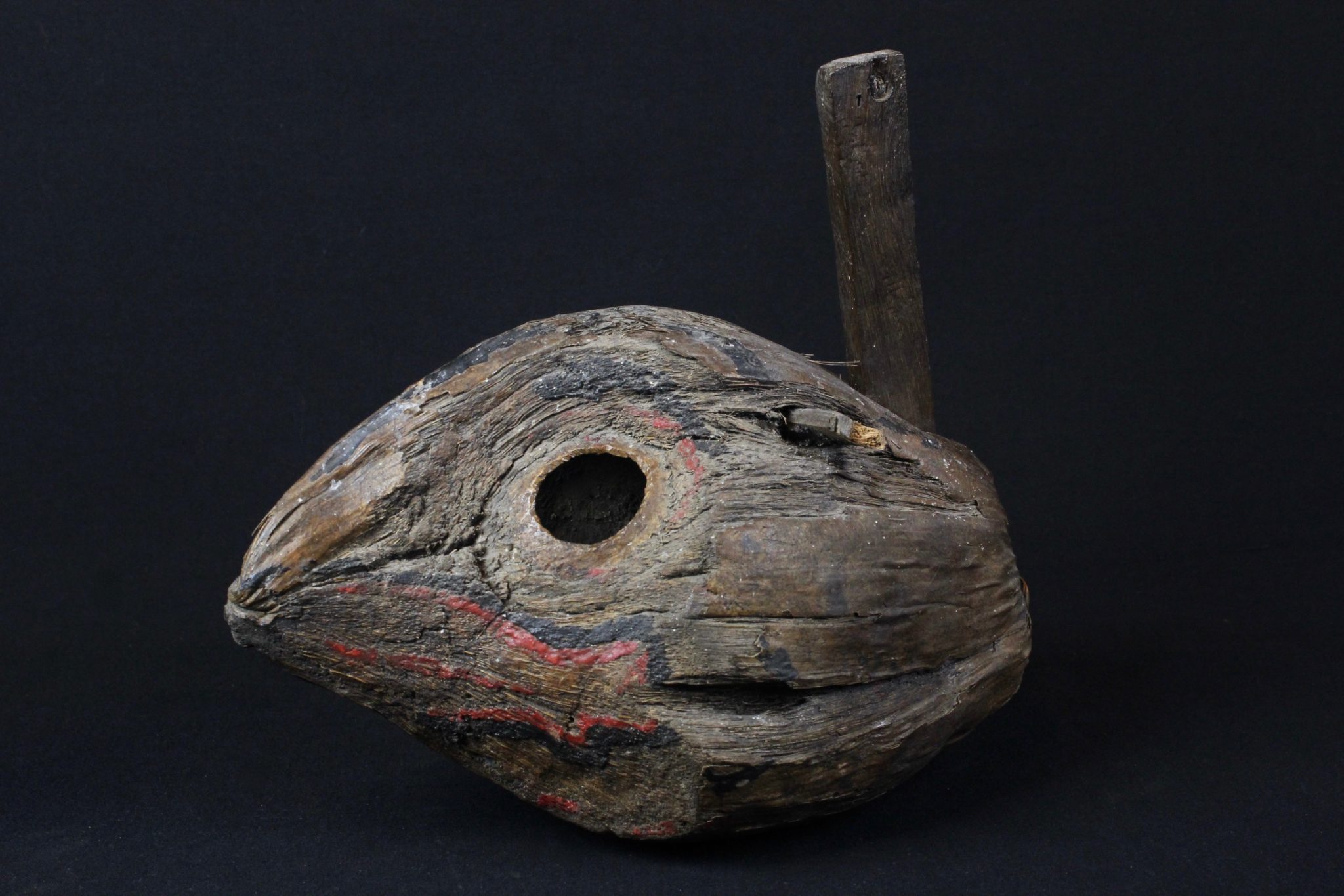 Effigy Mask Trap, East Sumba, Lesser Sunda Islands, Indonesia, Tana Mabanas village, Late 19th to early 20th c, Coconut, wood, pigment. Hangs in shaman’s house. Gathers and traps black magic. The shaman will then perform a ritual to disperse them and to keep them from returning. 9 ½” x 8” x 10 ¾”, $700.