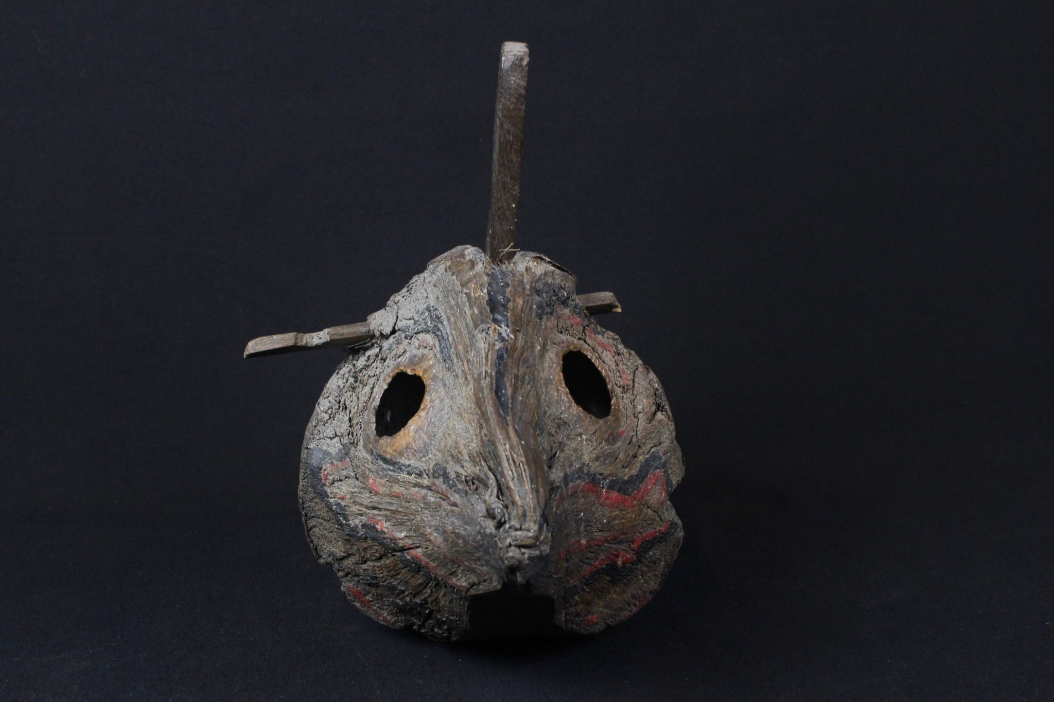 Effigy Mask Trap, East Sumba, Lesser Sunda Islands, Indonesia, Tana Mabanas village, Late 19th to early 20th c, Coconut, wood, pigment. Hangs in shaman’s house. Gathers and traps black magic. The shaman will then perform a ritual to disperse them and to keep them from returning. 9 ½” x 8” x 10 ¾”, $700.