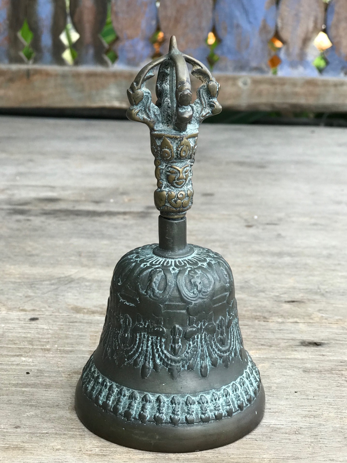 Musical Instrument, temple clapper bell with face, Nepal, 150 years old, bronze, The Bell, representing the female aspect, stands for wisdom. It is held in the left hand. If the Dorje (crown motif on top) is separate, it is held in the right hand. The are always used in combination in religious ceremonies. Together they represent enlightenment. 6 1/2" x 3 1/4", $900. thedavidalancollection.com , solana beach, ca